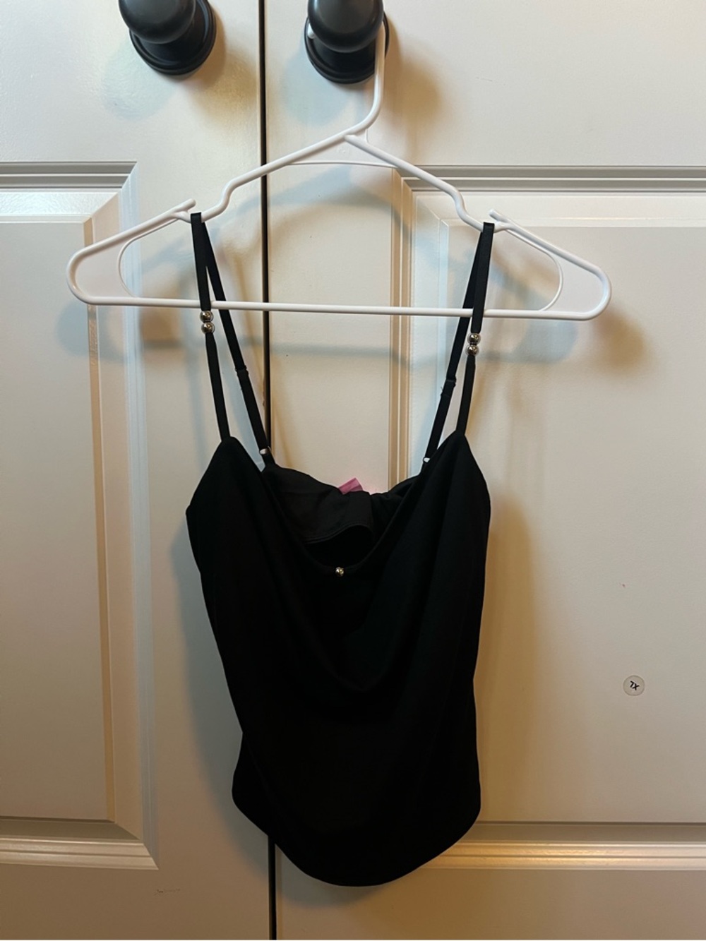 Black going out top